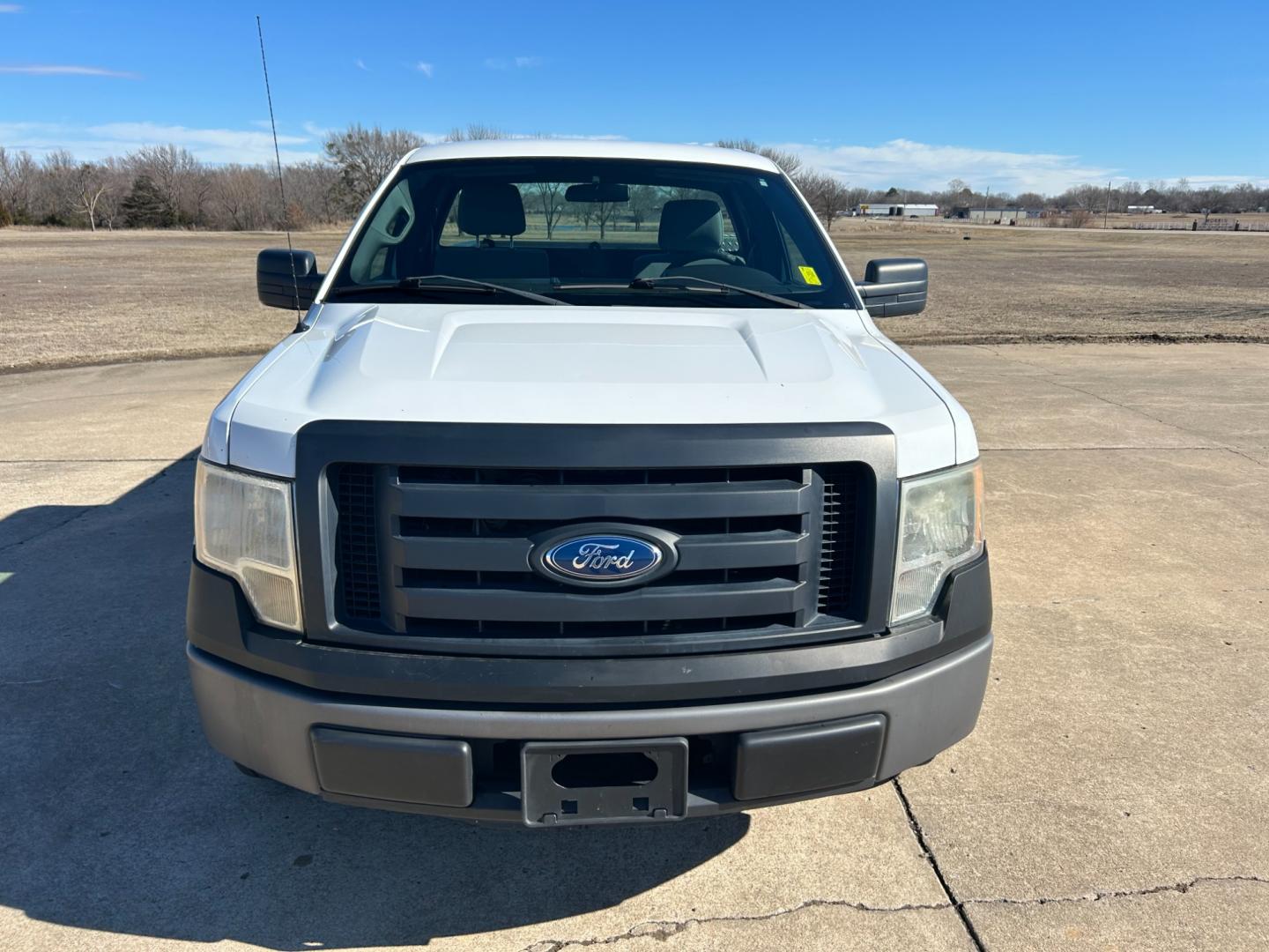 2011 White /Gray Ford F-150 STX 6.5-ft. Bed 2WD (1FTPF1CF1BK) with an 5.0L V8 OHV 16V engine, 4-Speed Automatic transmission, located at 17760 Hwy 62, Morris, OK, 74445, (918) 733-4887, 35.609104, -95.877060 - 2011 FORD F-150 HAS THE 5.0L V8 AND IS RWD. FEATURES POWER LOCKS, POWER WINDOWS, POWER MIRRORS, AM/FM STEREO, SIRIUS STEREO CD PLAYER, AUXILLARY PORT, BED LINER, CRUISE CONTROL, TRACTION CONTROL, MULTI-FUNCTION STEERING CONTROL. A PREMIER ALTERNATIVE FUEL CONVERSION THAT IS EPA-APPROVED. EXTREMELY C - Photo#1